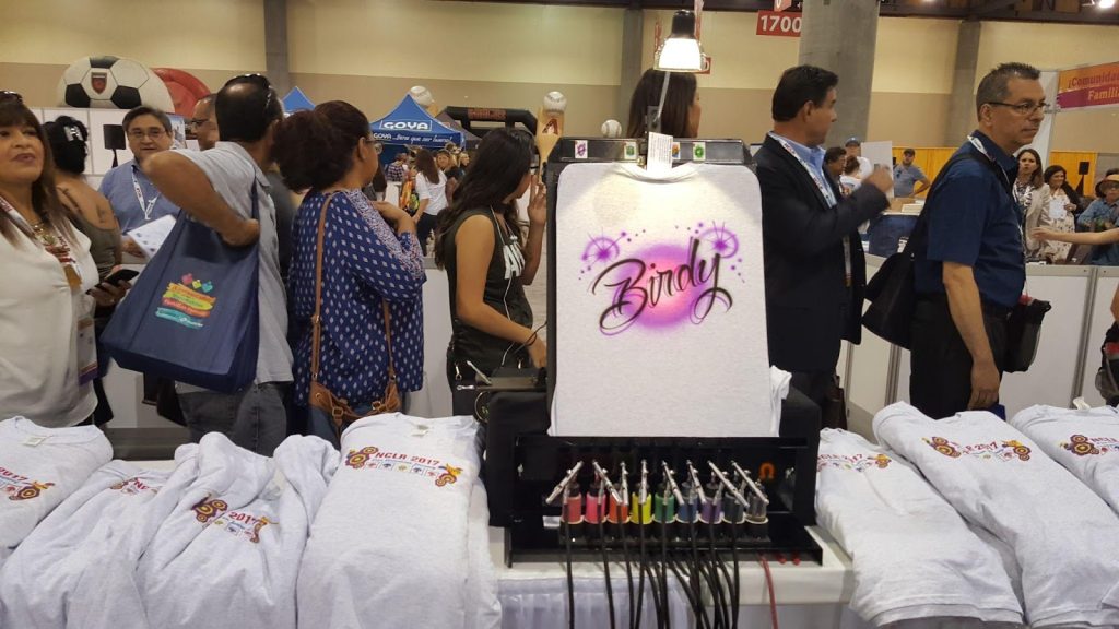 Airbrush at a trade show booth is a great way to get attention.