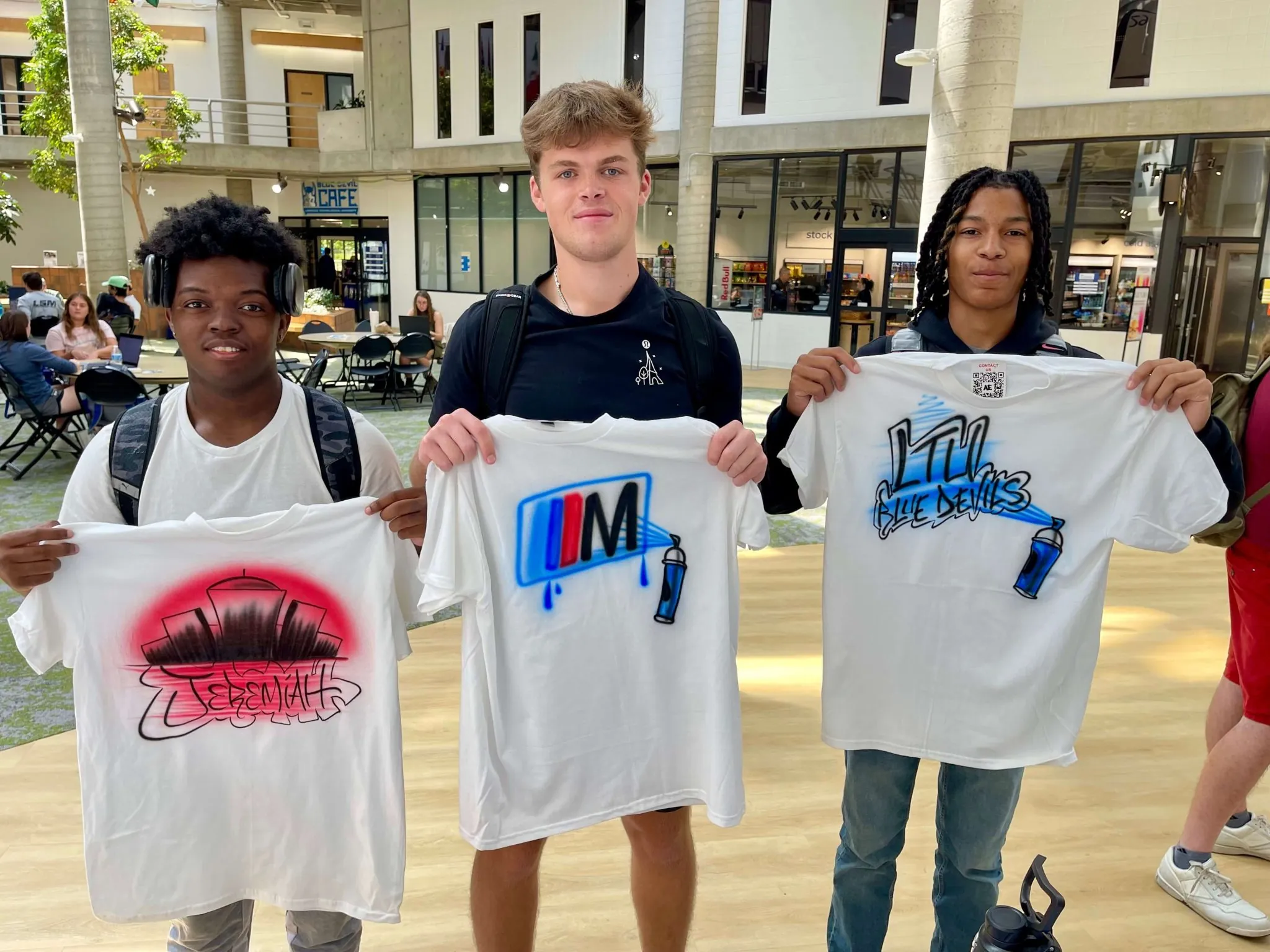 Students with t-shirts from Airbrush Events.